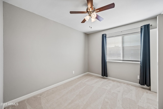 unfurnished room with light carpet and ceiling fan