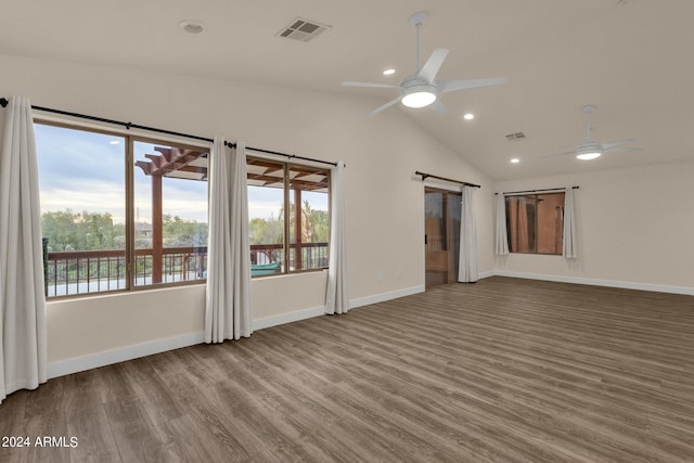 unfurnished room with wood-type flooring, lofted ceiling, and ceiling fan