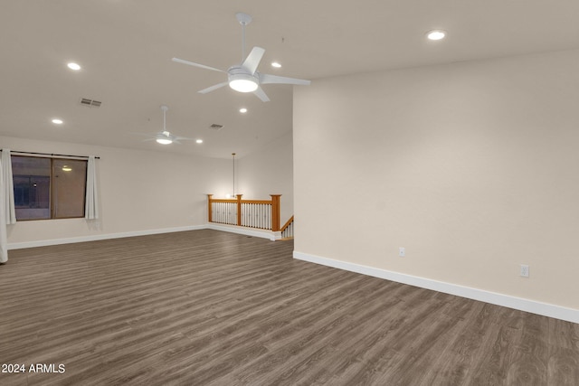 interior space with ceiling fan and dark wood-type flooring