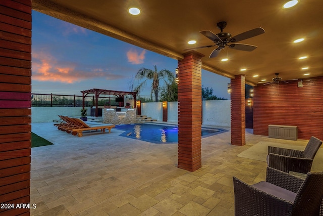 pool at dusk with a patio, a jacuzzi, ceiling fan, and a pergola