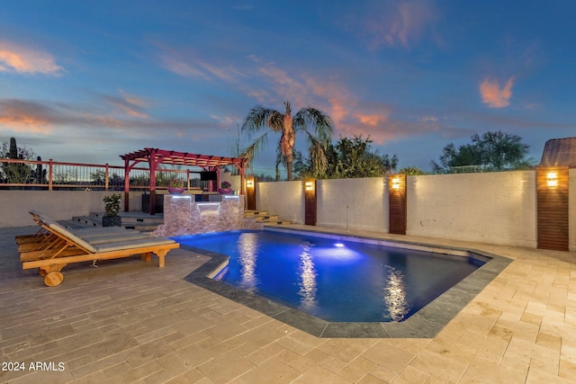 pool at dusk with a pergola, a patio, and pool water feature