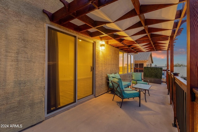 view of patio terrace at dusk