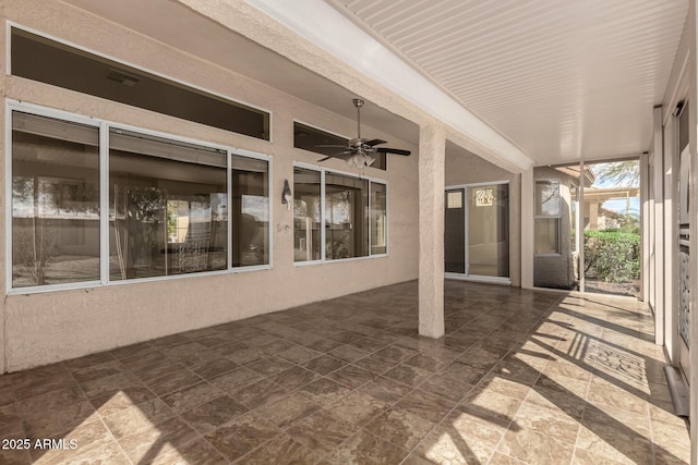 view of patio with visible vents and a ceiling fan