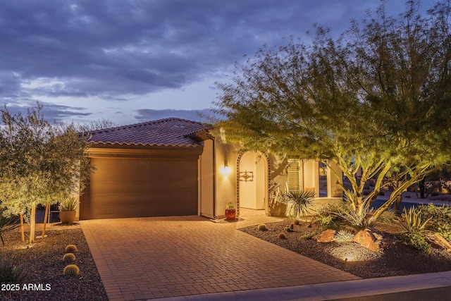 view of front of house with a garage