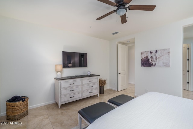 tiled bedroom with ceiling fan