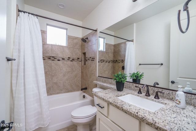 full bathroom with vanity, toilet, and shower / bath combo with shower curtain