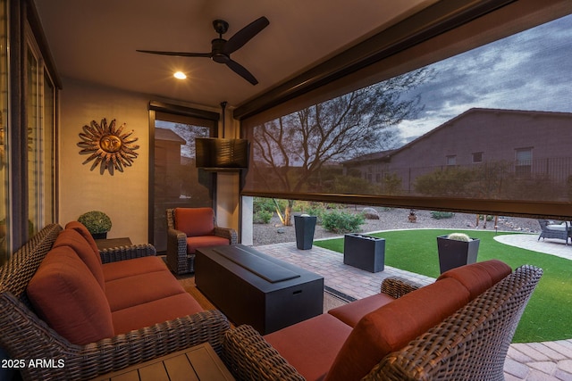 view of patio / terrace with ceiling fan and an outdoor hangout area