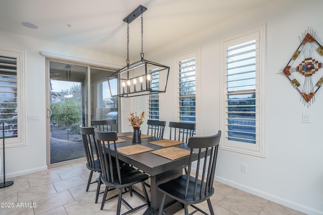 dining room with light tile patterned flooring