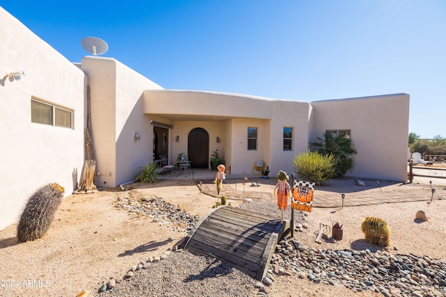 view of front of house featuring a patio area