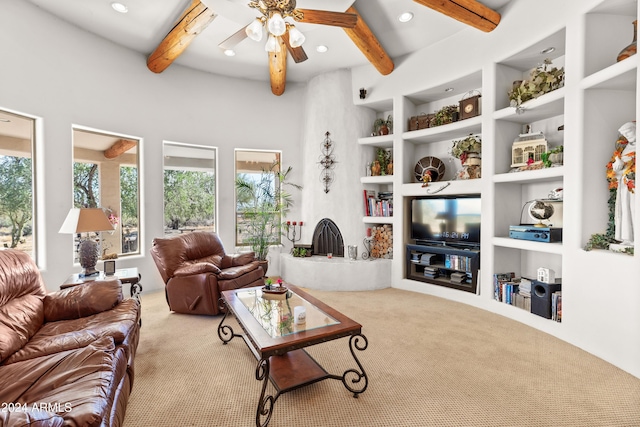 living room featuring built in features, a wealth of natural light, and beam ceiling