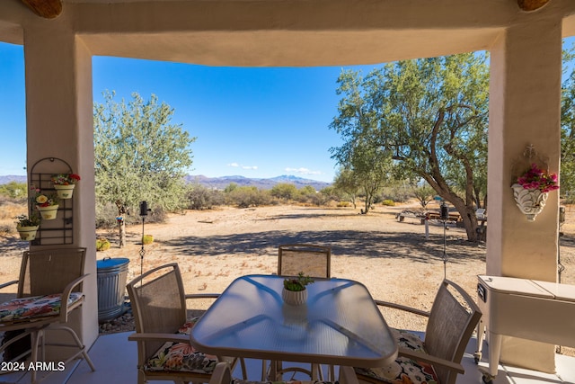 view of patio with a mountain view