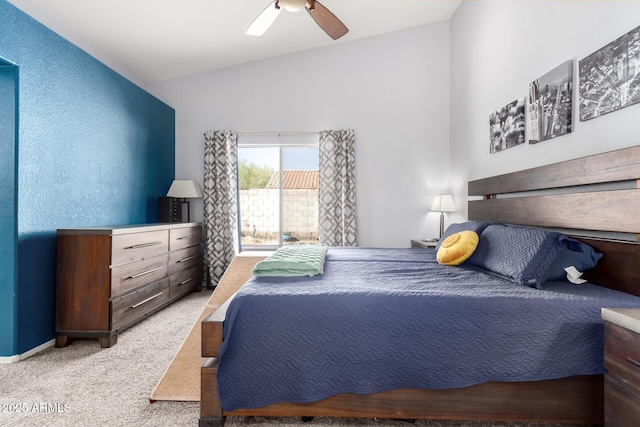 carpeted bedroom featuring ceiling fan and lofted ceiling