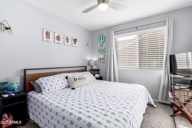 bedroom with ceiling fan and carpet