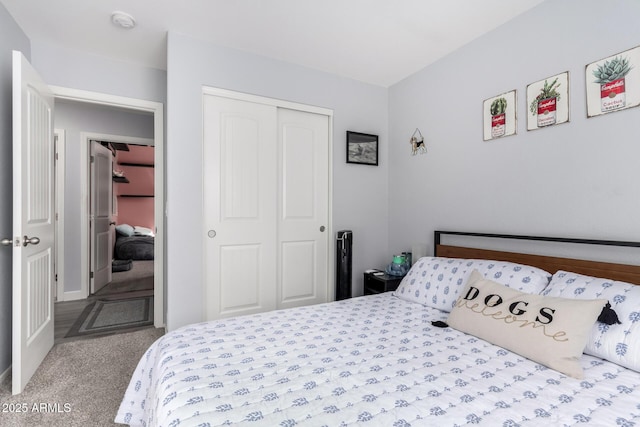 bedroom with light colored carpet and a closet