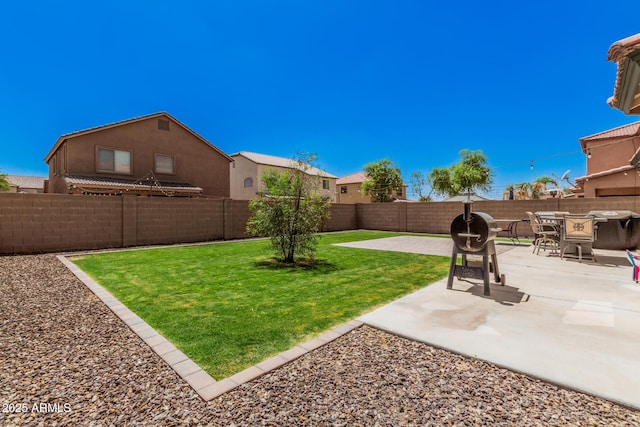 view of yard featuring a fenced backyard and a patio