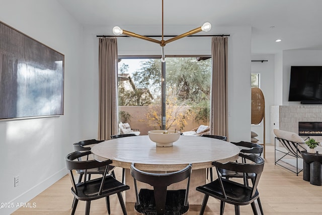 dining space featuring light hardwood / wood-style floors