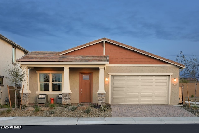 view of front of property with a garage