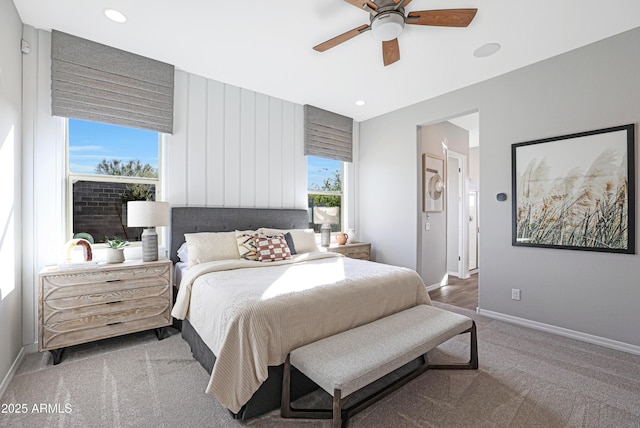 bedroom featuring ceiling fan and carpet