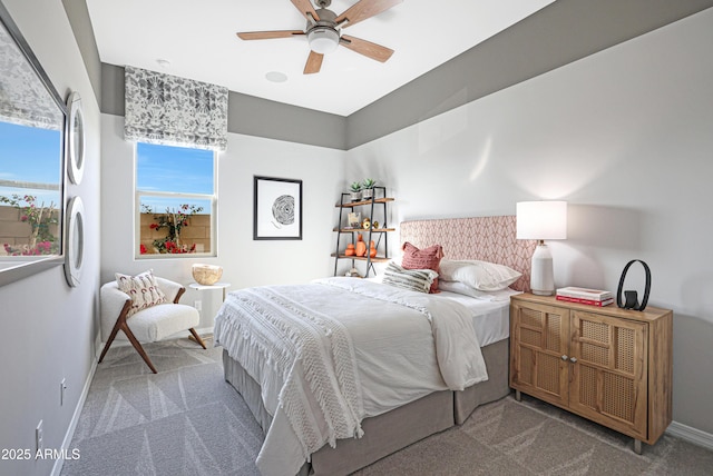 bedroom with ceiling fan and carpet