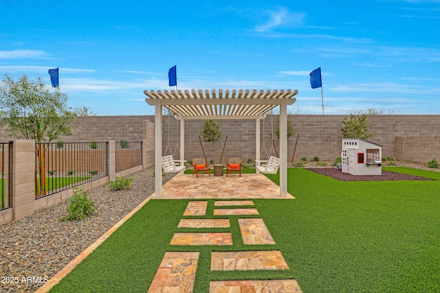 view of yard with a pergola and a patio area