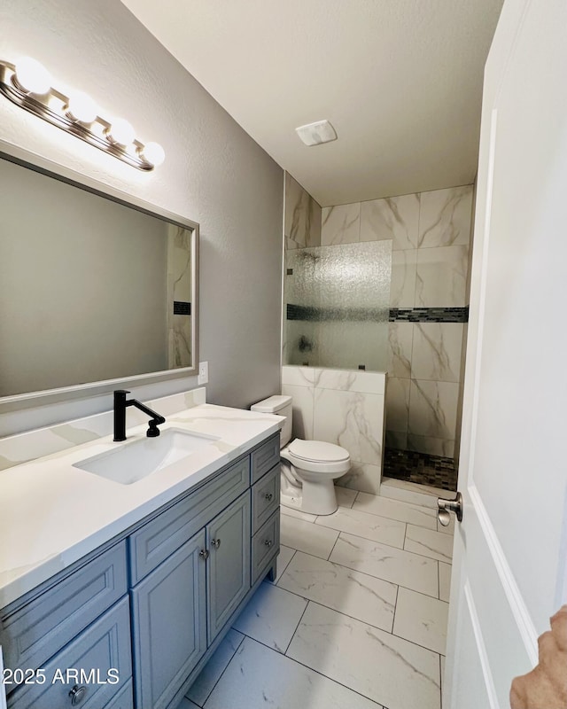 full bathroom with walk in shower, marble finish floor, vanity, and toilet
