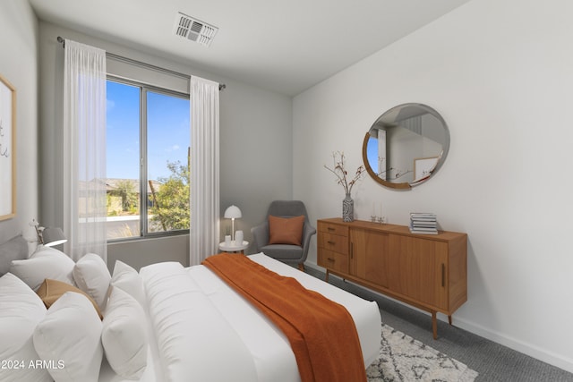 bedroom featuring carpet and multiple windows