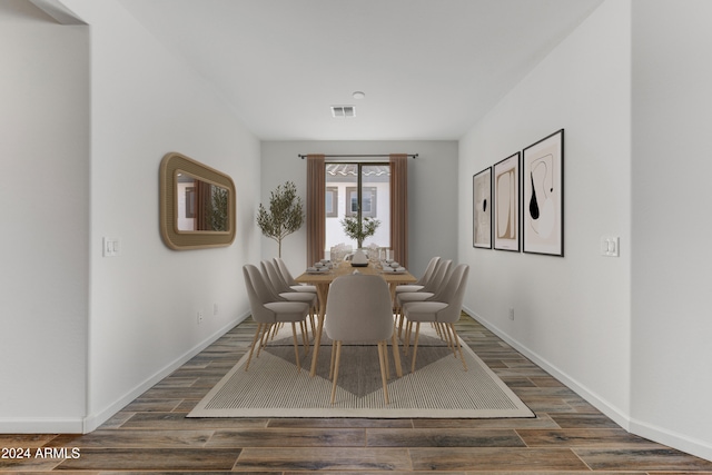 dining space featuring dark hardwood / wood-style floors