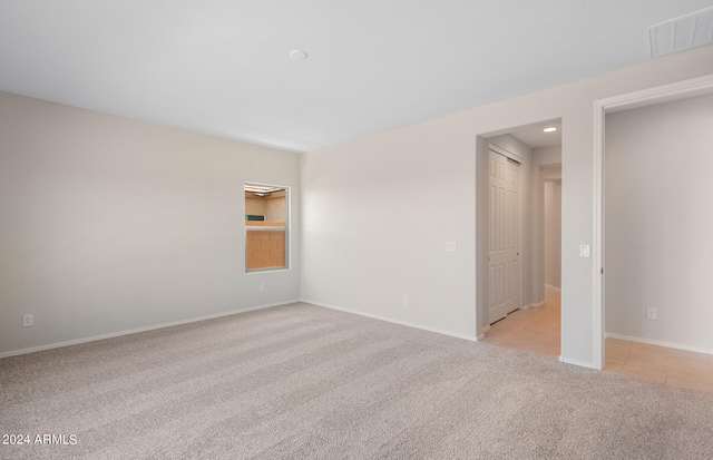 view of carpeted spare room