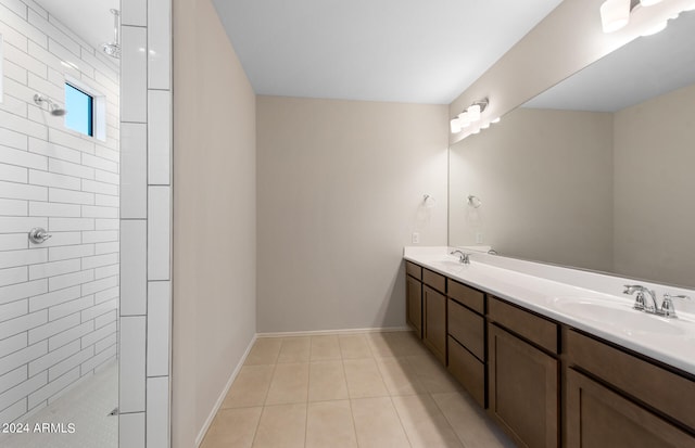 bathroom featuring tile patterned floors and double sink vanity