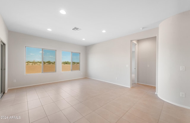 view of tiled spare room