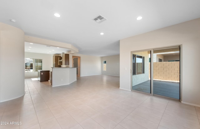 empty room featuring light tile patterned floors