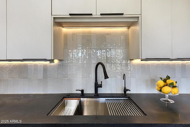 12225 E Cortez Dr, Scottsdale, AZ 85259 - interior details featuring tasteful backsplash, a sink, and dark countertops