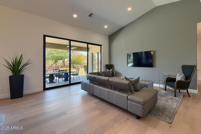 12225 E Cortez Dr, Scottsdale, AZ 85259 - living area with visible vents, baseboards, recessed lighting, light wood-style flooring, and high vaulted ceiling