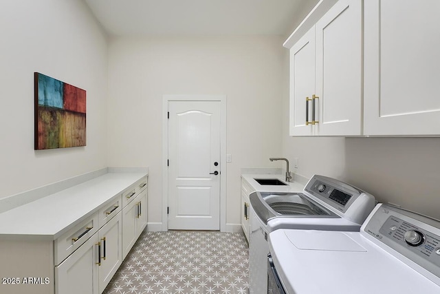 12225 E Cortez Dr, Scottsdale, AZ 85259 - washroom with light floors, a sink, cabinet space, and washer and clothes dryer