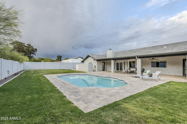 11942 N 95th St, Scottsdale, AZ 85260 - view of pool with a fenced backyard, a lawn, and a patio area