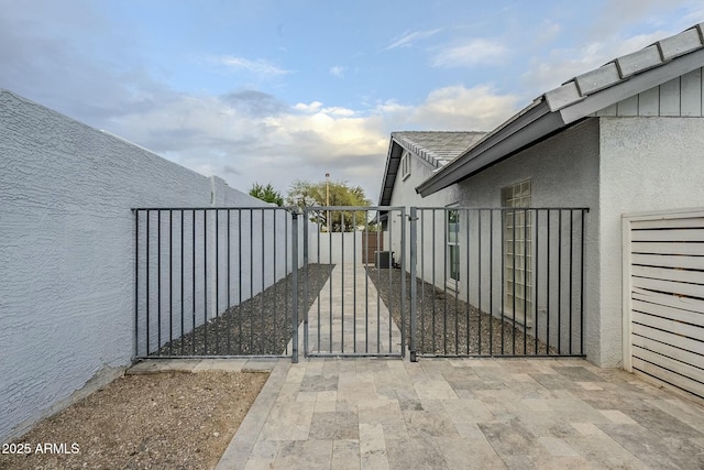 11942 N 95th St, Scottsdale, AZ 85260 - view of gate with central AC and fence