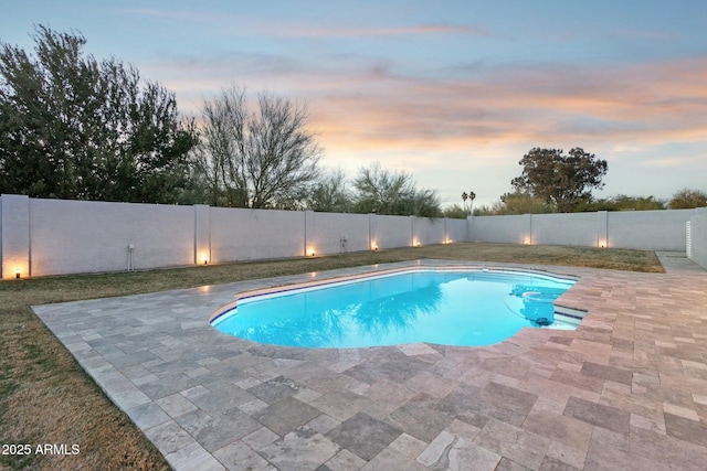 11942 N 95th St, Scottsdale, AZ 85260 - pool at dusk with a patio, a fenced in pool, and a fenced backyard