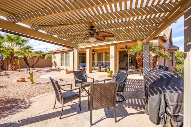 view of patio with outdoor dining space, fence, a ceiling fan, and a pergola