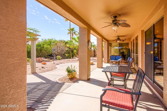 view of patio / terrace featuring a ceiling fan