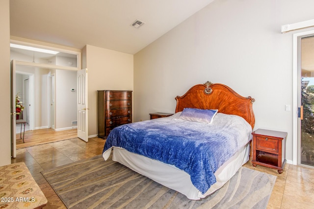 bedroom with baseboards, visible vents, and tile patterned flooring