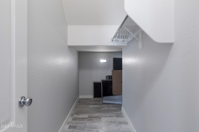 hallway featuring hardwood / wood-style flooring