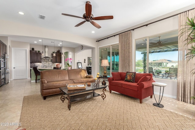 4149 N Brigadier Dr, Florence, AZ 85132 - living area featuring visible vents, arched walkways, a ceiling fan, and recessed lighting