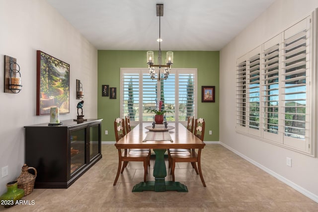 4149 N Brigadier Dr, Florence, AZ 85132 - dining area featuring baseboards and an inviting chandelier