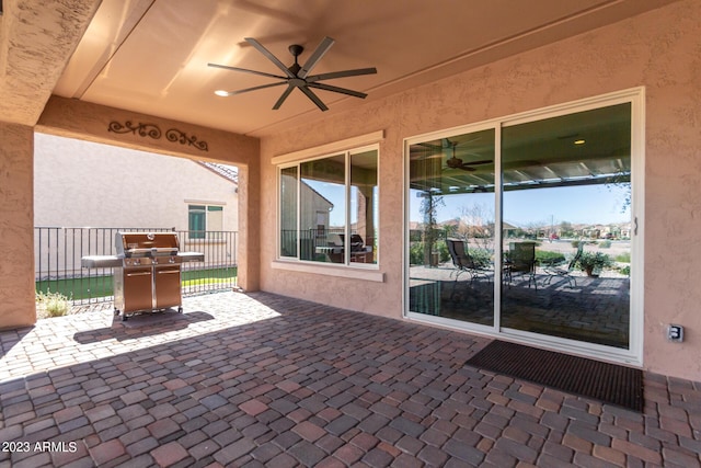 4149 N Brigadier Dr, Florence, AZ 85132 - view of patio / terrace featuring ceiling fan, fence, and grilling area