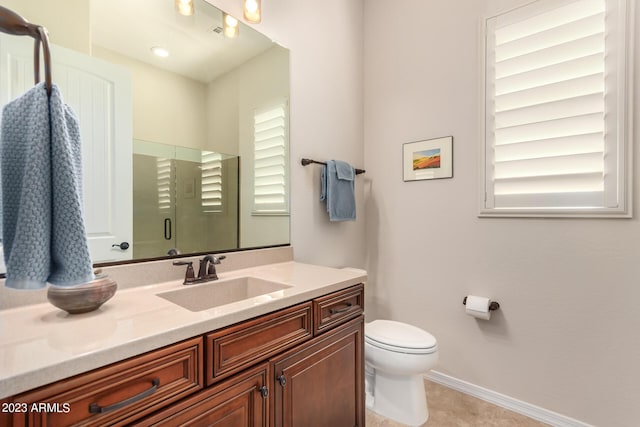4149 N Brigadier Dr, Florence, AZ 85132 - full bath with toilet, vanity, baseboards, tile patterned floors, and a stall shower