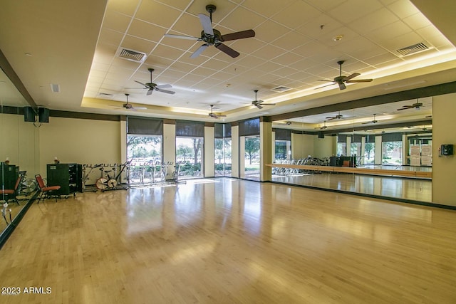 4149 N Brigadier Dr, Florence, AZ 85132 - workout area featuring light wood finished floors, a drop ceiling, a raised ceiling, and visible vents