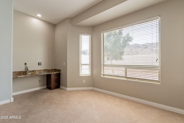 2701 E Caldwell St, Phoenix, AZ 85042 - interior space with recessed lighting, baseboards, light carpet, and built in study area
