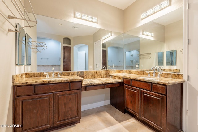 2701 E Caldwell St, Phoenix, AZ 85042 - full bath with a sink, tile patterned floors, and double vanity