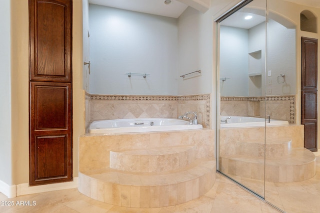 2701 E Caldwell St, Phoenix, AZ 85042 - bathroom featuring tile patterned flooring and a garden tub