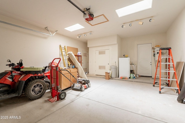 2701 E Caldwell St, Phoenix, AZ 85042 - garage featuring a garage door opener